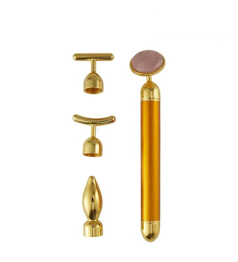 Appareil massage anti-âge maison avec accessoires en or pour un soin facial revitalisant
