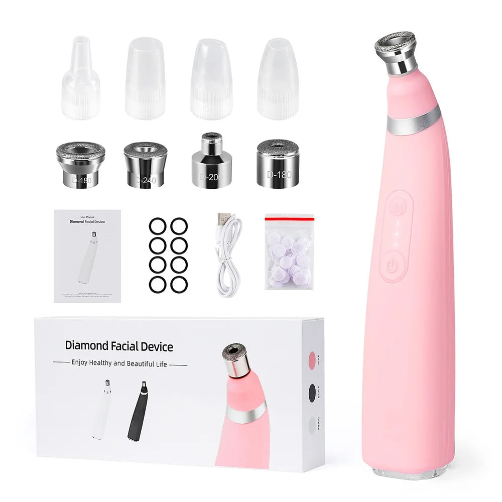 Appareil micro dermabrasion maison en rose avec accessoires inclus pour un soin facial efficace