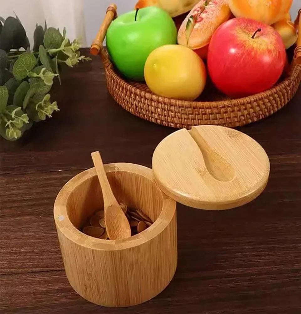 Boîte à condiments bambou ronde avec couvercle et cuillère en bois pour un service élégant