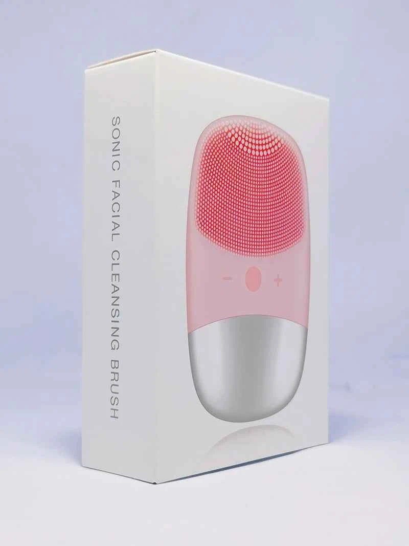 Emballage de brosse nettoyante sonique rose avec des picots en silicone pour un nettoyage doux du visage