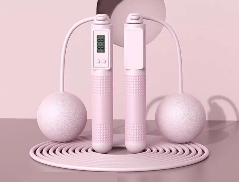 Corde à sauter connectée rose avec compteur numérique et poignées ergonomiques