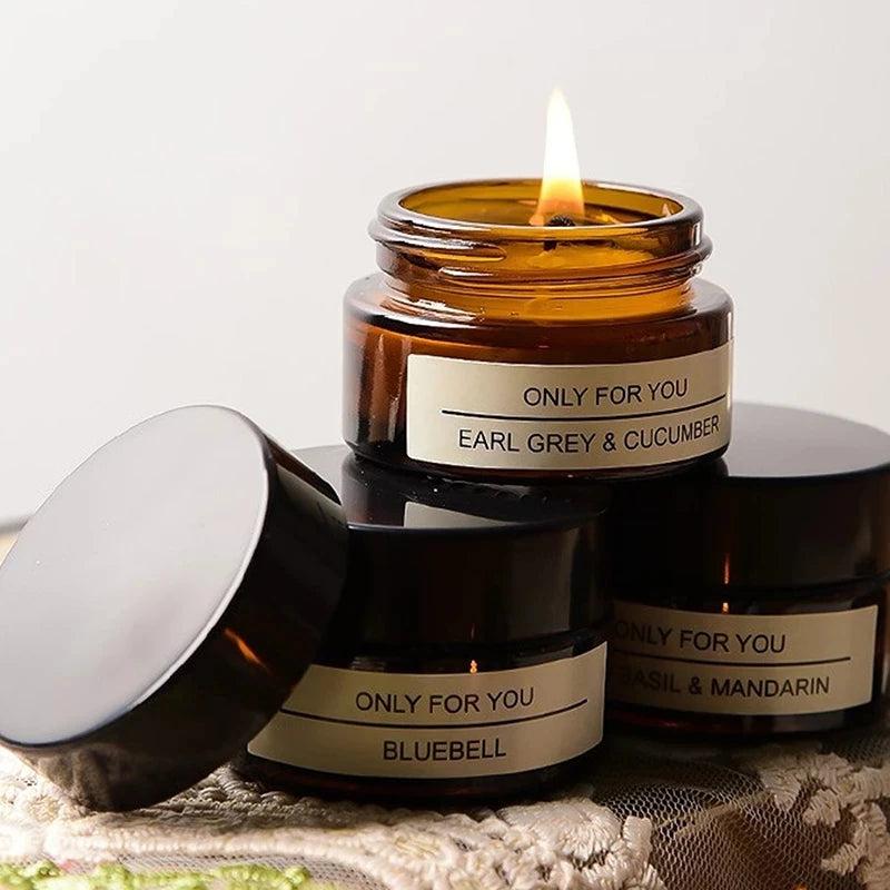 Bougie aromathérapie en verre ambré parfum Earl Grey et concombre, idéale pour la détente