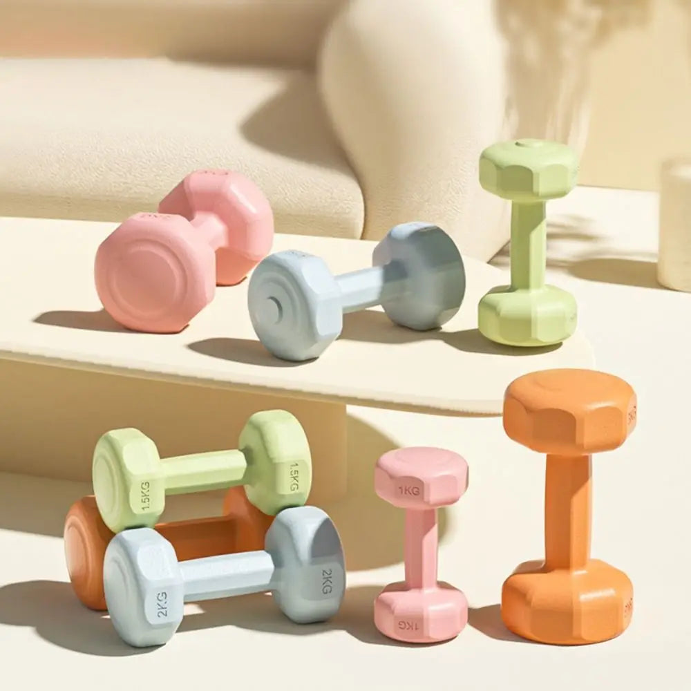 Petits haltères colorés en pastel pour l'entraînement à domicile avec différentes poids disponibles