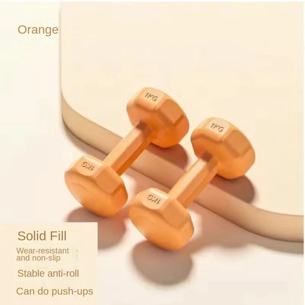 Petits haltères colorés orange avec remplissage solide, anti-roulement et résistants à l'usure