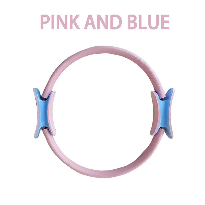 Anneau de pilates rose et bleu, conçu pour améliorer les entraînements de yoga et de fitness