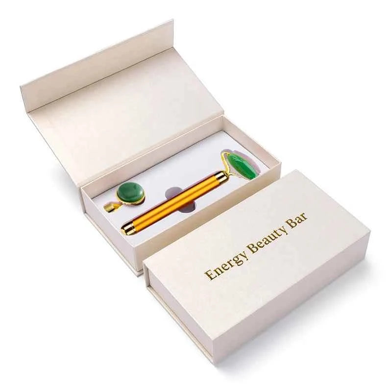 Boîte contenant un rouleau de massage en jade vibrant, idéale pour le soin de la peau et la relaxation