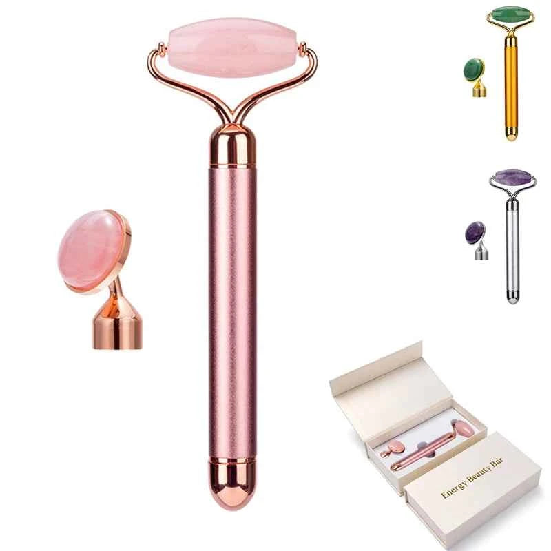 Rouleau de massage en jade vibrant rose avec un design élégant et accessoires variés dans une boîte sophistiquée