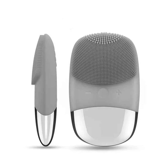 Brosse nettoyante sonique en silicone gris avec têtes interchangeables pour un nettoyage doux du visage