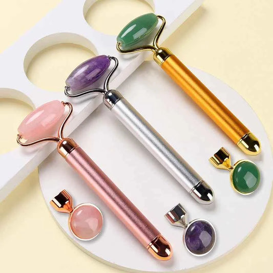Rouleau de massage en jade vibrant avec différentes pierres pour un soin du visage relaxant